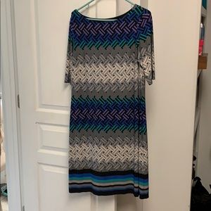 Sheath dress with mid length sleeve.